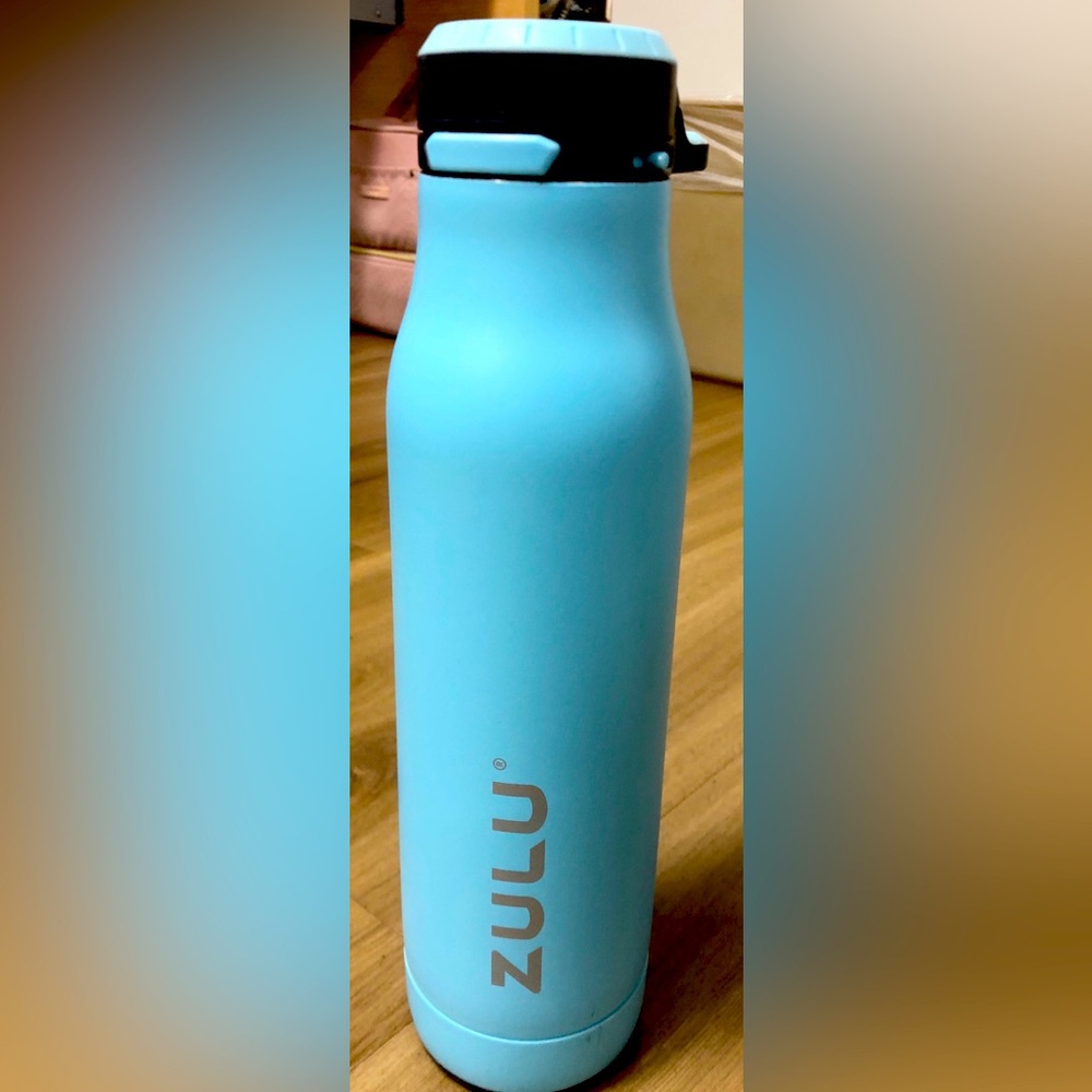 Ace vacuum insulated stainless steel water bottle.  Ice Blue